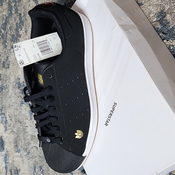 Men's Superstar Pure Black Sneakers Gold Trefoil Logo FZ2145 - Picture 2 of 8